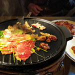 30CM Round Cast Iron Korean BBQ Grill Plate with Handles and Drip Lip